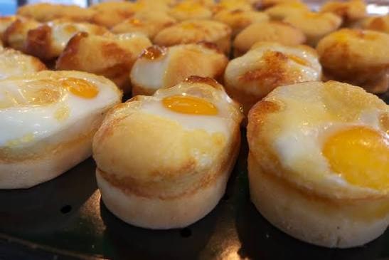 Gyeranppang egg bread with a whole egg baked on top of each small loaf